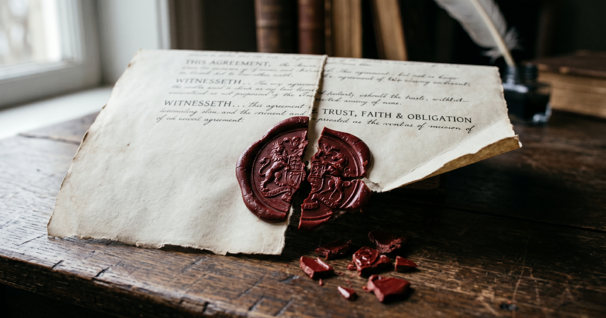 A broken wax seal on an old document, symbolizing the failure of trust in traditional systems.